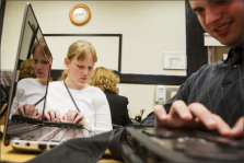 Laura Boelens, 15, left, and Adam Roberge, 20, work with teacher Kate Crohan in a computer class at Perkins School for the Blind in Watertown, Mass. Education Week.