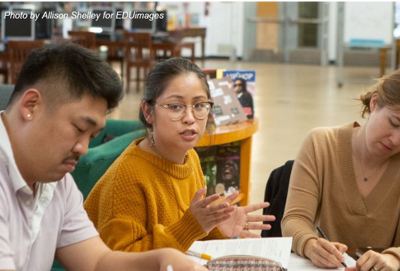 Teacher talking with colleagues