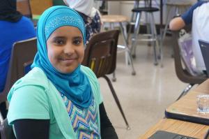 Student smiling at camera