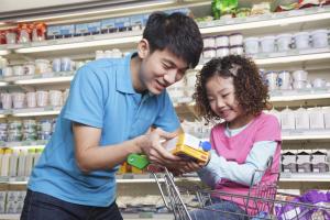 Father and daughter at grocery store