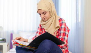 Girl studying in room