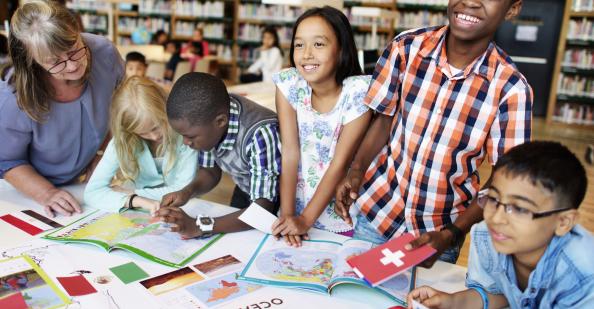 Students looking at a map