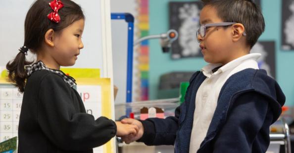 Students greeting each other