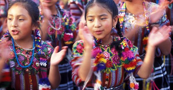 Young Indigenous girls dancing