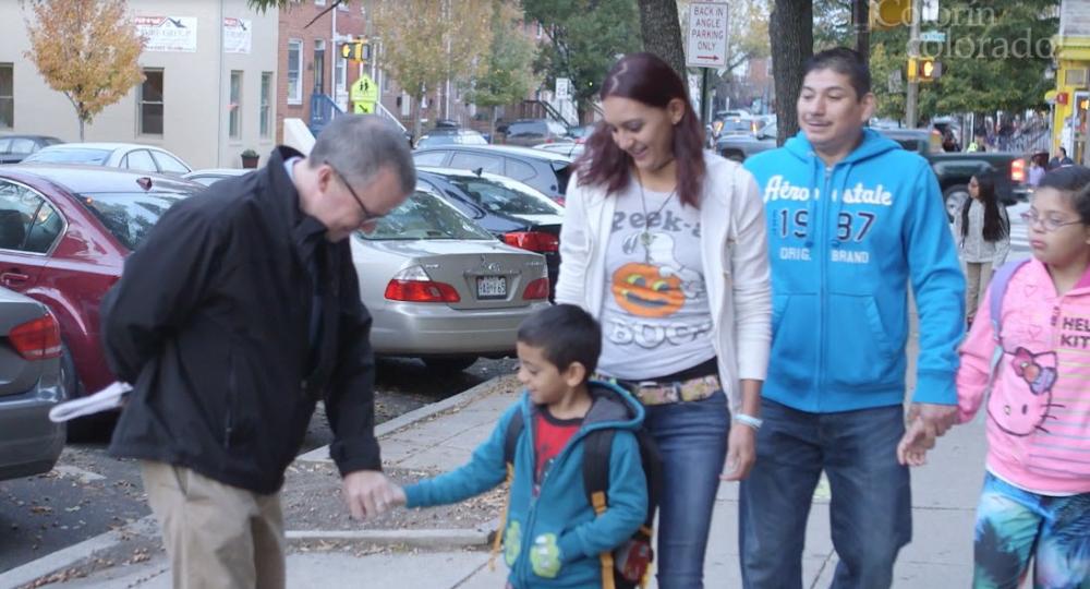 Principal greeting family